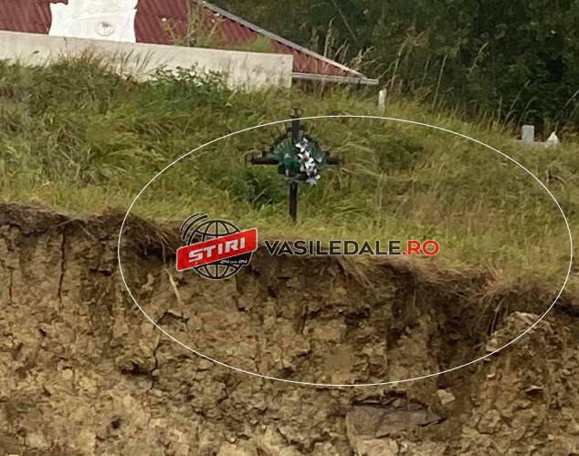 EXCLUSIV FOTO: Butănenii din Borșa au construit ilegal sub un cimitir. Acum încep să se vadă sicriele