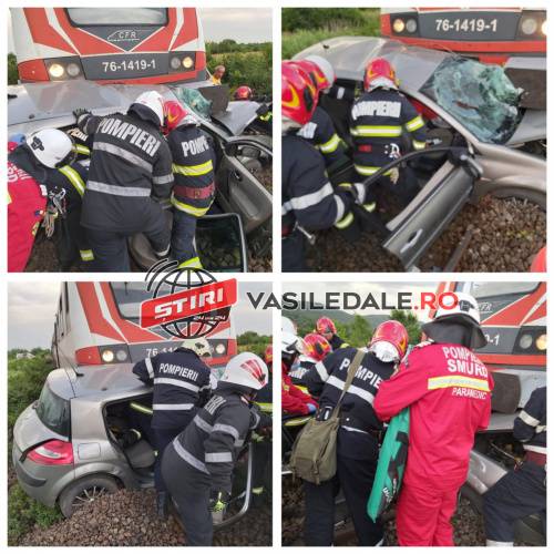 ACCIDENT FEROVIAR / ACTUALIZARE: Maşină lovită de tren, o persoană încarcerată (GALERIE FOTO, VIDEO)