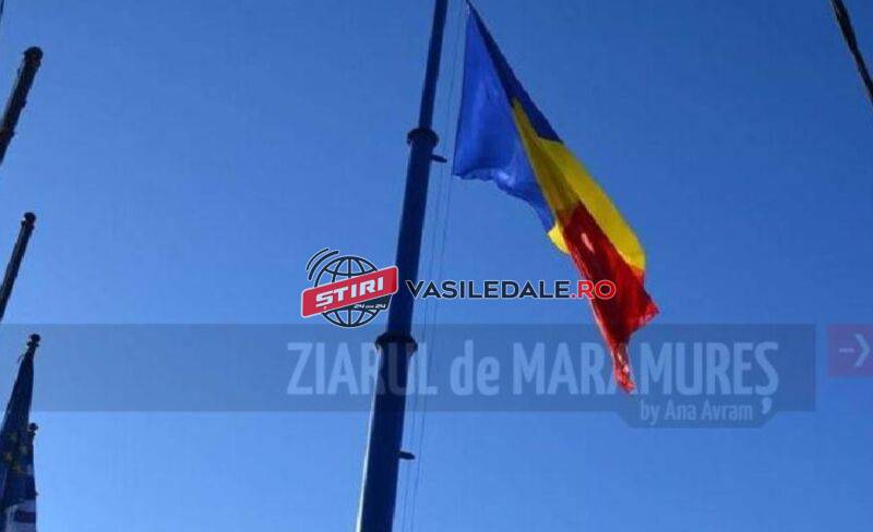 Situație incredibilă la Primăria Tăuții Măgherăuș. Un angajat a tăiat cu foarfeca drapelul României
