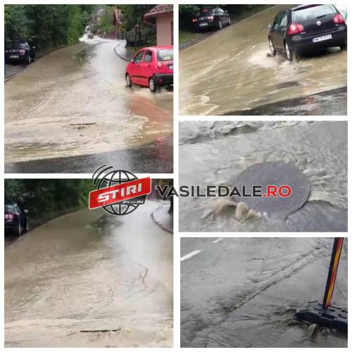 VIDEO: Strada Valea Hotarului din zona Iapa a Sighetului acoperită de ape. Localnicii sunt disperați