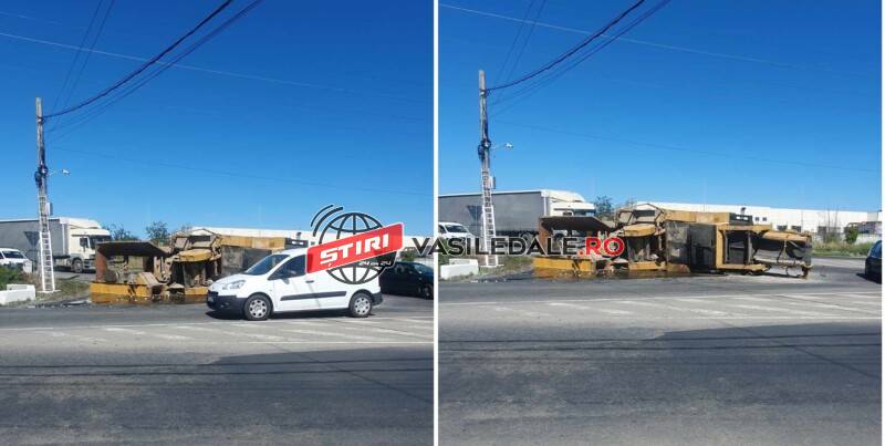 FOTO / GRAV INCIDENT ÎN BAIA MARE: Un concasor a căzut de pe platforma unui TIR