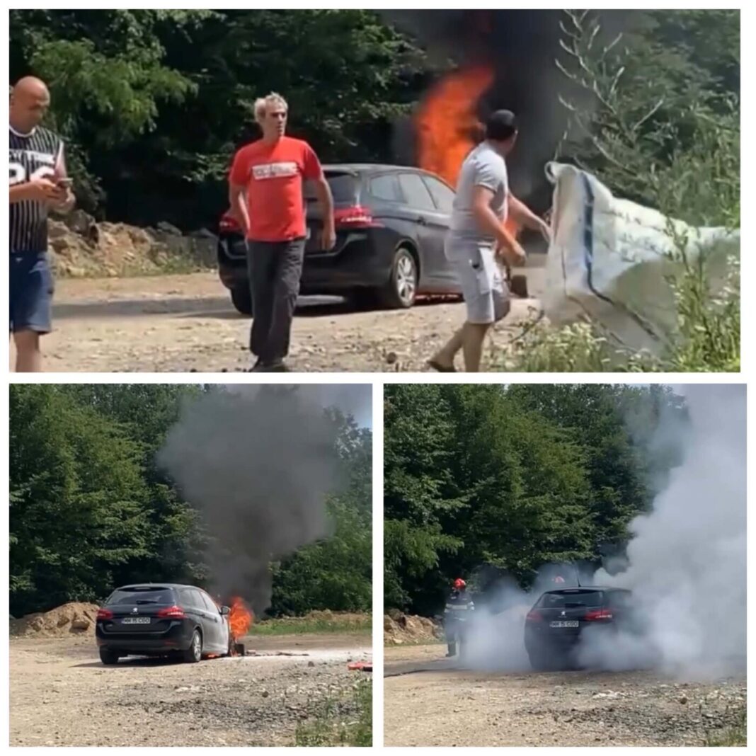SUB COD ROȘU DE CANICULĂ: O mașina a luat foc între Coaș și Copalnic după ce motorul a ”fiert” pe urcare (VIDEO)